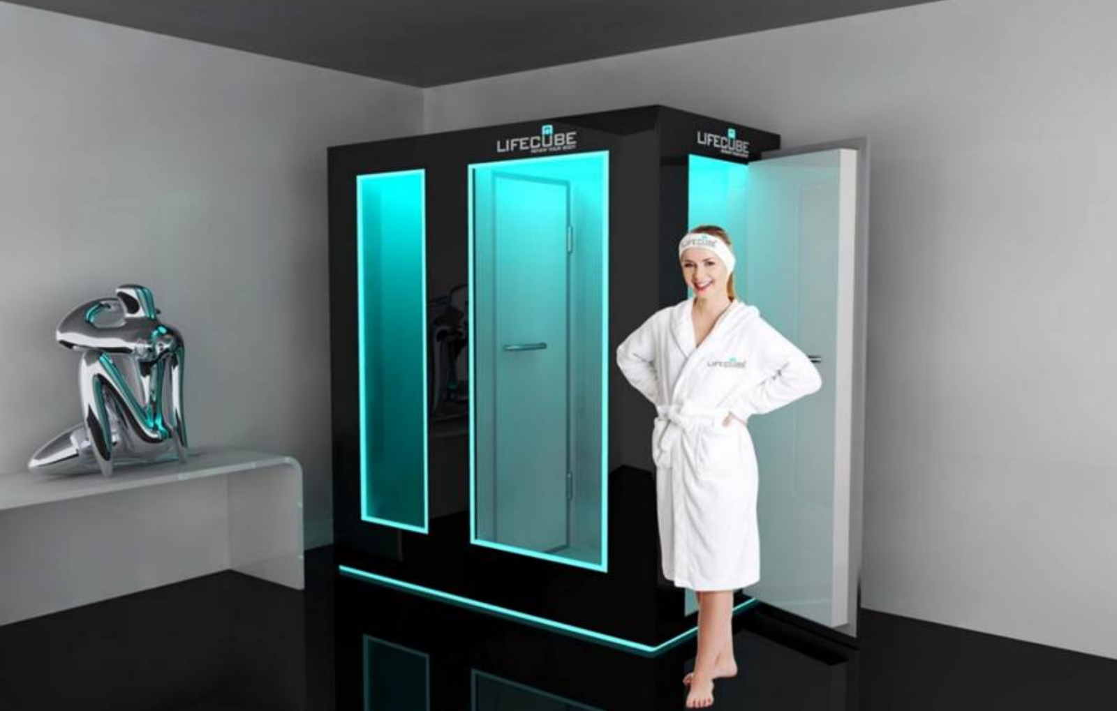 Person standing in a whole-body cryotherapy chamber at a wellness clinic, surrounded by cold mist.